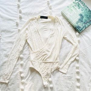 Naked Wardrobe Plunging V Body Suit